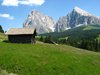 A mountain hut and Sassolungo from the Alpe di Siusi 
