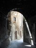  Streetscape through an archway in Scanno