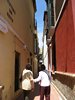 Colourful passageway in Seville's Barrio de Santa Cruz